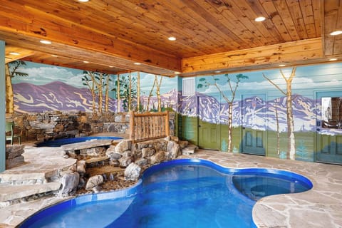The best pool room in the Smokies! Upper pool for littles, huge lower pool for everyone, waterfalls and more!