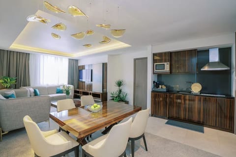 Living room with dining area and kitchenette