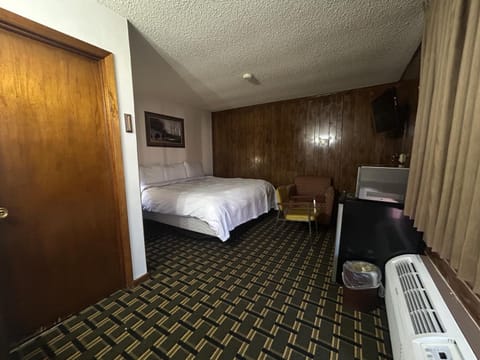 Spread out comfortably with in-room TV and convenient mini-fridge.