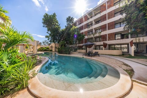 Beautiful outdoor pool with a peaceful atmosphere and plenty of space to sunbathe.
