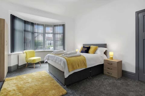Bedroom 1 benefits from a comfortable double-sized bed with plenty of storage. 