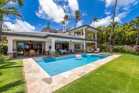 Palm-lined grounds and bright blue skies create a picture-perfect backdrop for island living.
