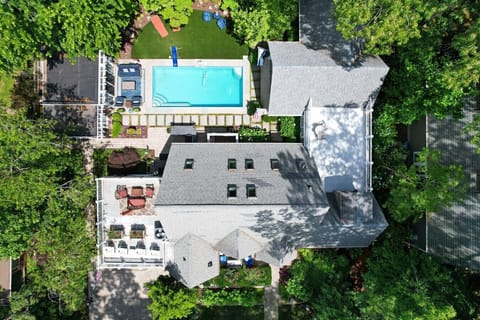 Aerial perspective of the home and private pool, designed for relaxation and outdoor living