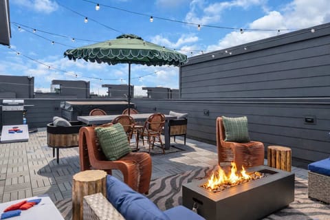 Kick back and relax—cozy rooftop seating made for conversations, cocktails, and catching the sunset.