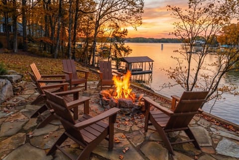 Every evening ends here. We leave firewood out, light it up, pull up a chair, and let the lake do the rest.