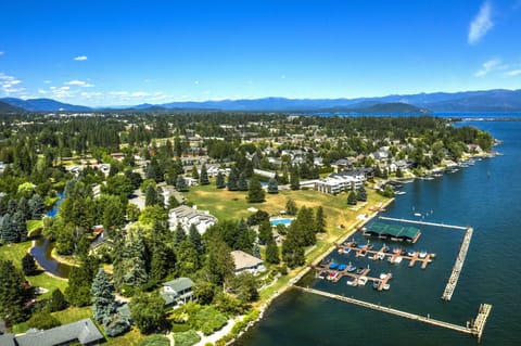 Aerial view of lakefront resort, Long Bridge and downtown in the background. 
