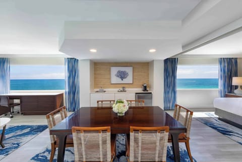 Gather for meals with a handy kitchenette and ocean horizon.