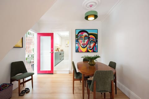 Enjoy effortless flow from the vibrant dining area to the gourmet kitchen and private courtyard.