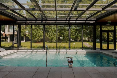 Float peacefully while sunlight filters through the glass roof.