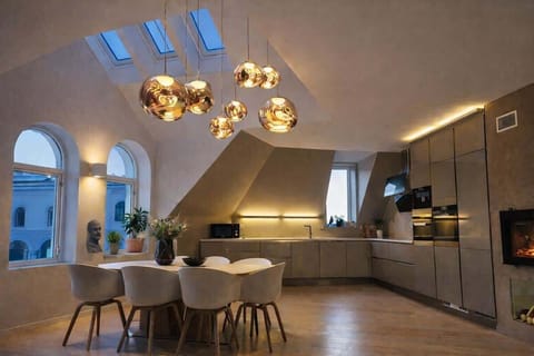 The tall ceiling and unique windows is a rare and luxurious vibe.