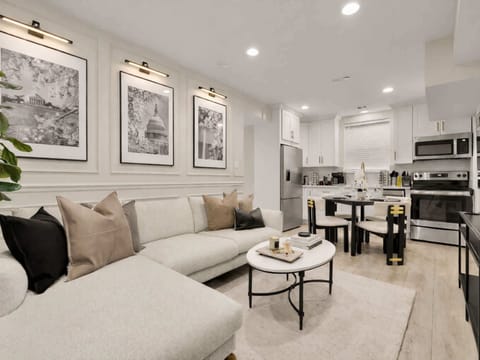 Settle in after a long day of sightseeing with everyone gathered in this open, comfortable living room built for easy conversation and real downtime.