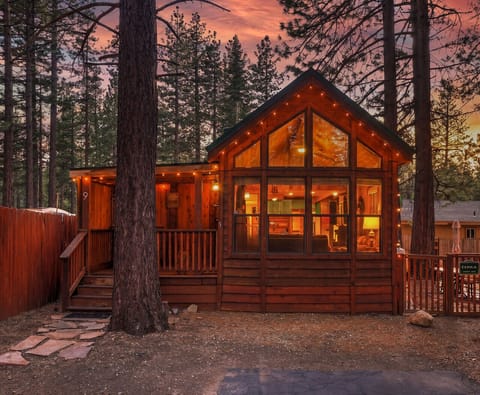Welcome to your charming Tahoe cabin getaway, surrounded by towering pines and nestled in a peaceful community. This home offers the perfect blend of nature and comfort.