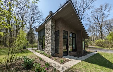 Exterior, surrounded by nature and wildlife, back patio with grill and firepit