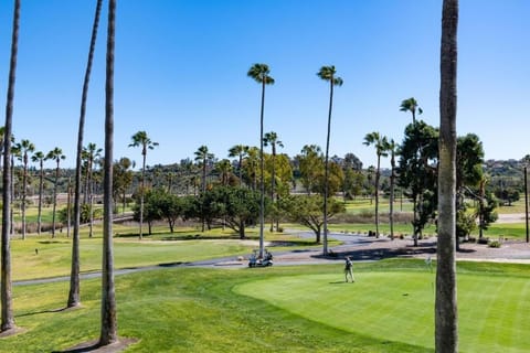 Imagine an easy afternoon stroll beside manicured greens nearby.