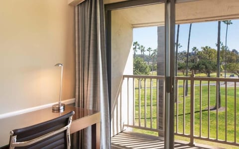 Step onto your private balcony and breathe in green views.