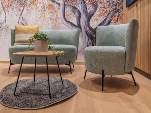 Furniture, Interior Design, Living Room, Comfort, Chair, Throw Pillow, Armrest, Coffee Table, Cushion, Pillow