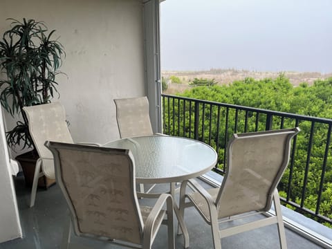 Direct oceanfront balcony with panoramic beach views—perfect for morning coffee, sunrise watching, and relaxing to the sound of the waves.