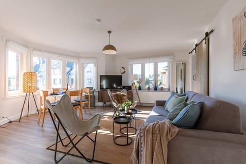 Bright living room with open layout and plenty of natural light.
