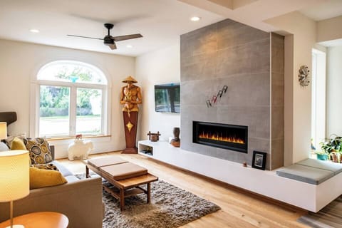 Main living area with modern gas fireplace.
