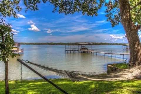 Relax and unwind on our hammock by the water