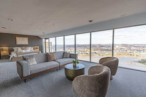 Luxurious king suite featuring beautiful city views and a private en-suite bathroom.