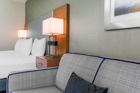 Lounge comfortably with soft textures and calming modern décor.
