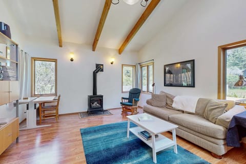 Morning light fills the cozy living room, where you can curl up by the gas fireplace with a good book or enjoy a movie night.