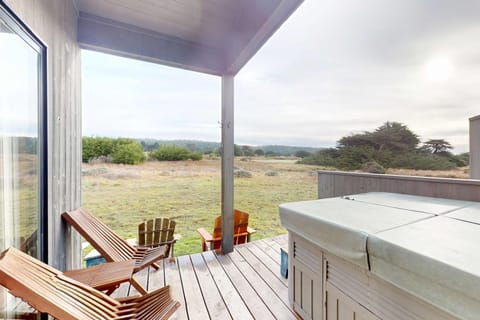 Relax in your hot tub on the deck, surrounded by nature and ready for stargazing after a day of exploration.