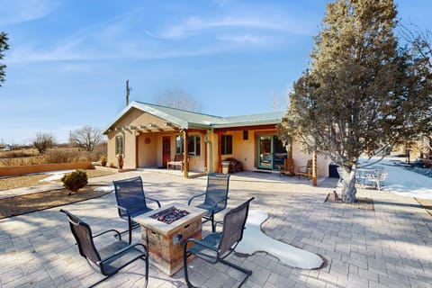 Welcome to Casa de Rufina, an extensively remodeled Arroyo Seco home with sweeping views of El Salto Mountain and Canyon.