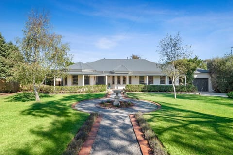 Elegant homestead with a stunning circular garden fountain