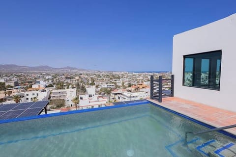Shared pool w/ city views, perfect for a refreshing dip under the sun