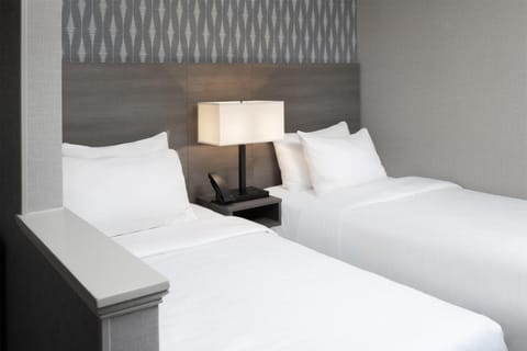 Sink into crisp linens for a calm, quiet night’s sleep.