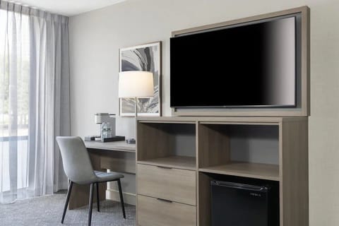 Kick back with a big TV and tidy workstation.