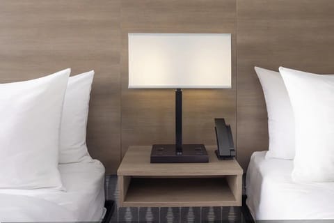 Stretch out in a bright double-queen room made for rest.