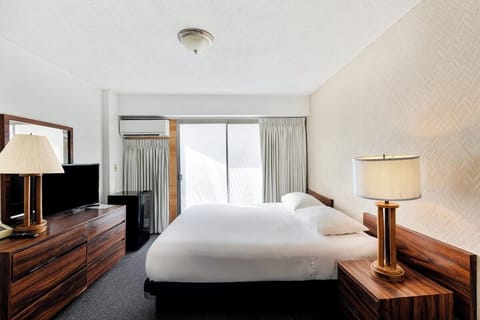 Unwind in a bright, airy room with calming natural light.