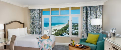Wake up to turquoise ocean vistas from crisp, cloud-soft bedding.