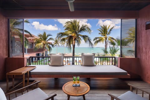 Sip cocktails on the daybed with sweeping ocean views.