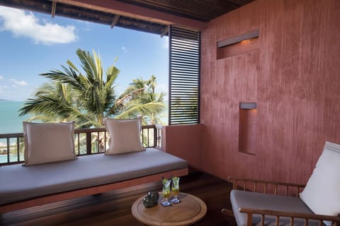 Sip cocktails on the private balcony while sea breezes roll in.
