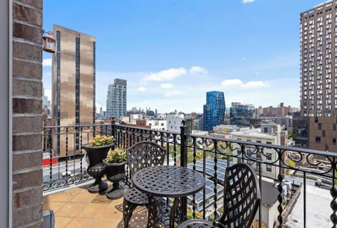 Sip morning coffee while taking in expansive city views.