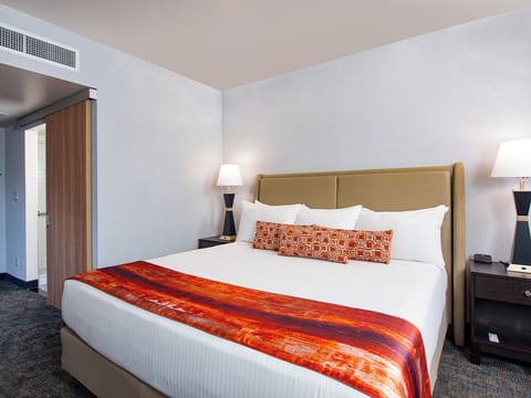 Stretch out on crisp linens and enjoy a calm, airy room.