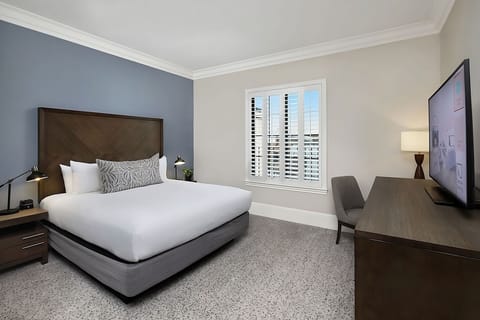 Relax after a long day in a crisp, modern king room.