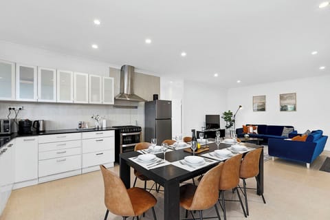 Gather, cook, and unwind in this beautifully light-filled, modern open-plan space. From a full kitchen to a cozy lounge, it’s the perfect place to feel right at home.