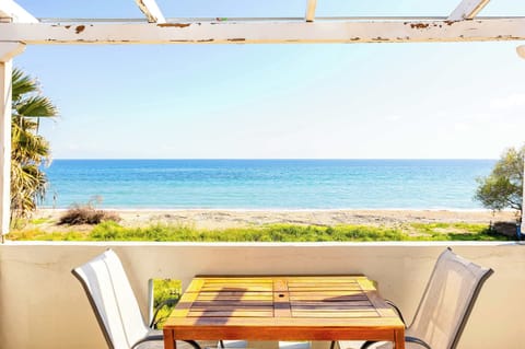 Spacious Balcony with Dining Table and Panoramic Sea View
