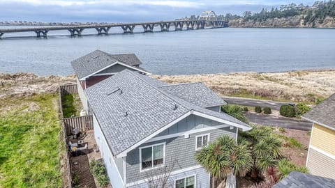 Waterfront property featuring stunning bridge views and coastal landscape from this elevated perspective.