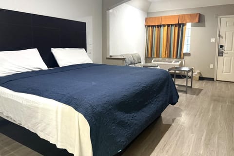 Unwind in a spacious suite with comfy sofa seating.