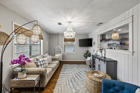 Relax in this comfortable living room with charming details