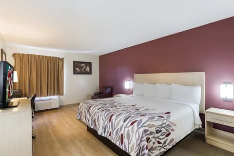 Relax into a spacious king bed after a long day.