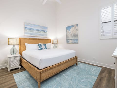 Unwind in crisp linens and breezy coastal comfort.