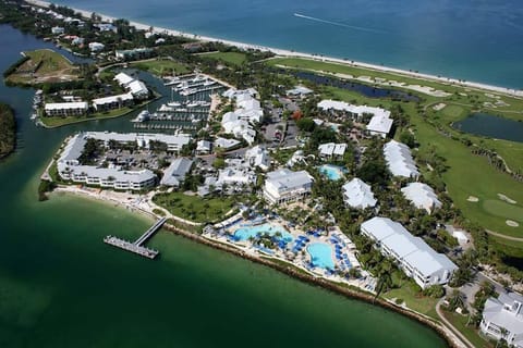 Explore the waterfront grounds and sparkling pools from above.