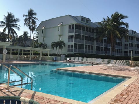 Unwind poolside with plenty of loungers and sunlit space.